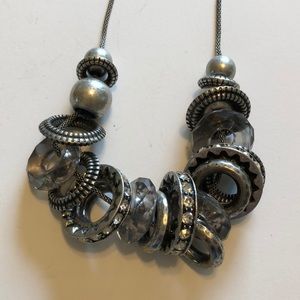 Statement necklace with multi media decor